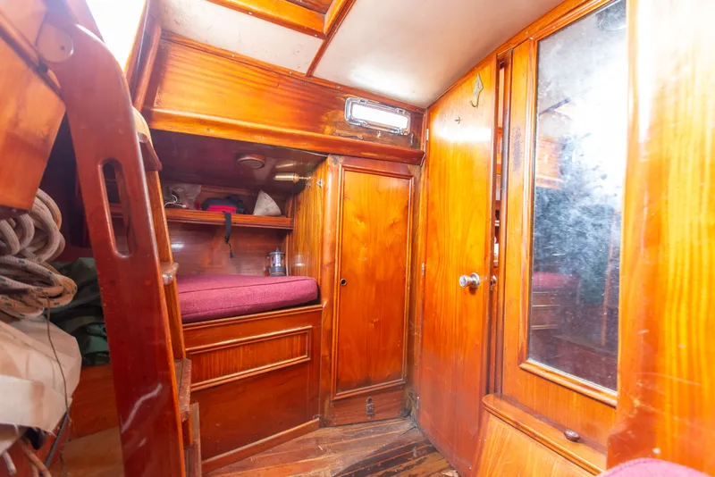 Slide: The Image of Interior of a 1984 Frers F&C 44 yacht with wooden furnishings. - 10