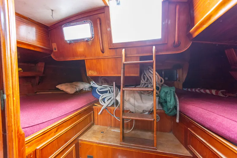 Slide: The Image of Interior of a 1984 Frers F&C 44 yacht with wooden finish. - 11