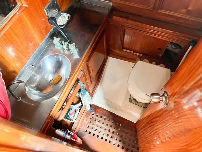 Slide: The Image of Interior view of a Frers F&C 44 yacht's head, built in 1984. - 12