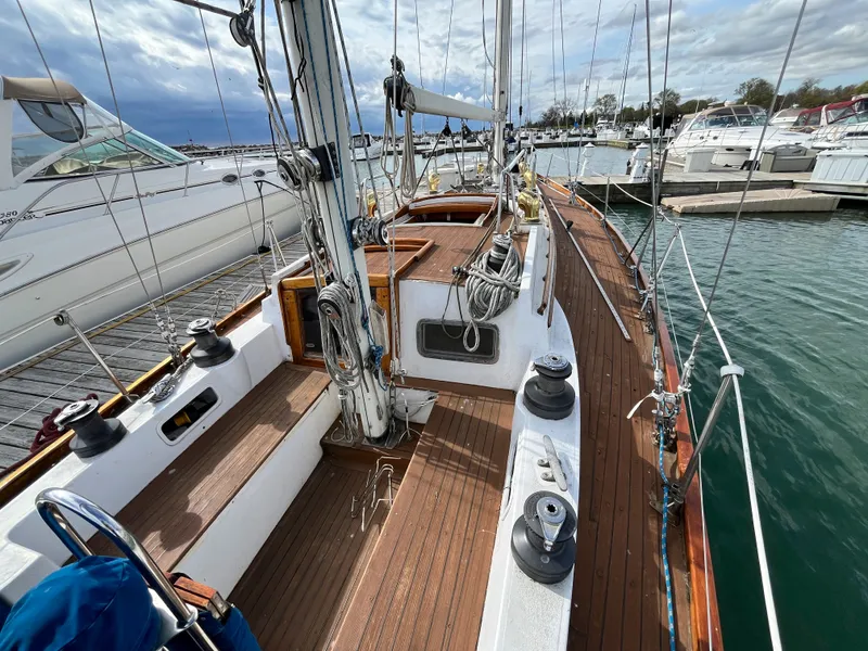 Slide: The Image of 1984 Frers F&C 44 sailboat docked at marina. - 4