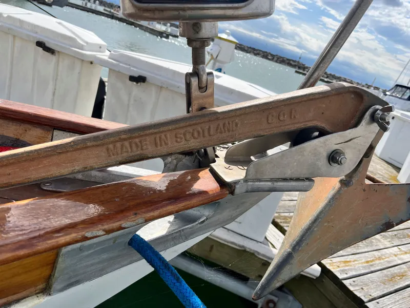Slide: The Image of Anchor on Frers F&C 44 sailboat, 1984 model, docked at harbor. - 6