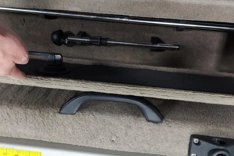 Slide: The Image of Interior storage compartment of a 2006 Tracker Pro Guide V-175 WT boat. - 9