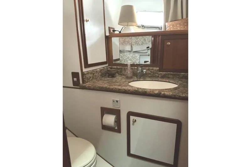 Slide: The Image of Bathroom in 2010 DeFever 48 Trawler with marble countertop. - 22