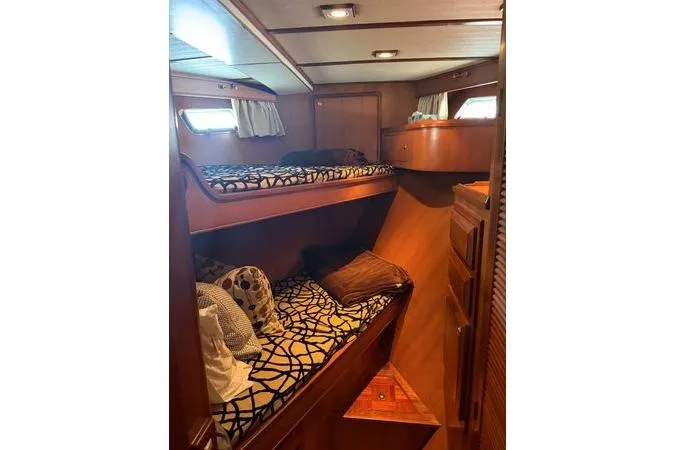 Slide: The Image of Helm of 2010 DeFever 48 Trawler with wooden wheel and navigation instruments. - 7