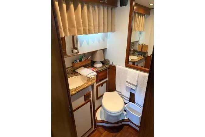 Slide: The Image of Electrical control panel of a 2010 DeFever 48 Trawler yacht with gauges and switches. - 9