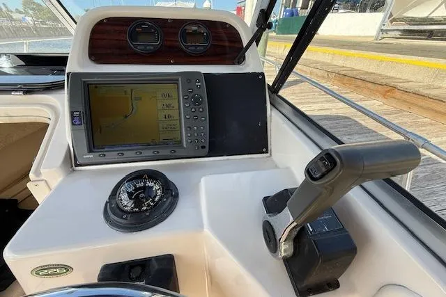 Slide: The Image of Control panel of a 2000 Grady-White Seafarer 22 boat with navigation equipment. - 18