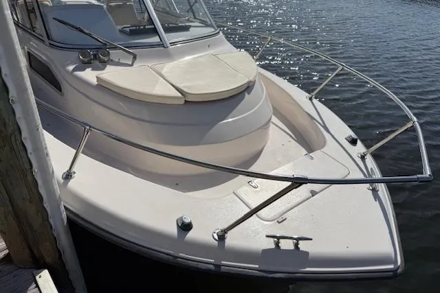 Slide: The Image of Grady-White Seafarer 22 boat, 2000 model, docked on calm water. - 28