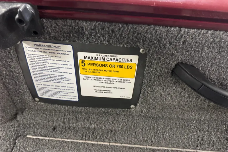 Slide: The Image of 2017 Tracker Pro Guide V-175 Combo capacity label, 5 persons or 760 lbs, safety checklist. - 13