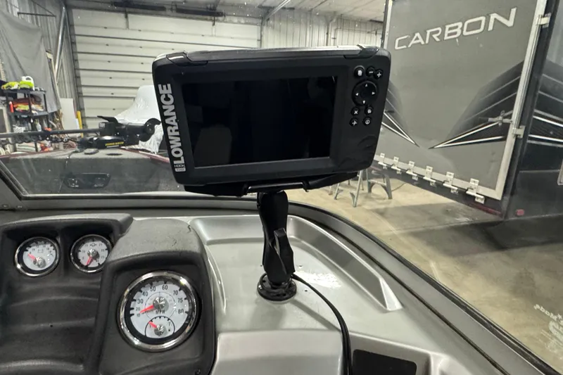 Slide: The Image of 2017 Tracker Pro Guide V-175 Combo dashboard with Lowrance fish finder and gauges. - 6