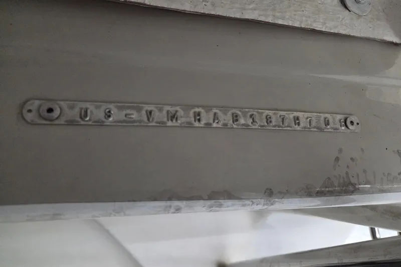 Slide: The Image of VIN plate on a 2007 Mariah SX19 boat, displaying identification number. - 12