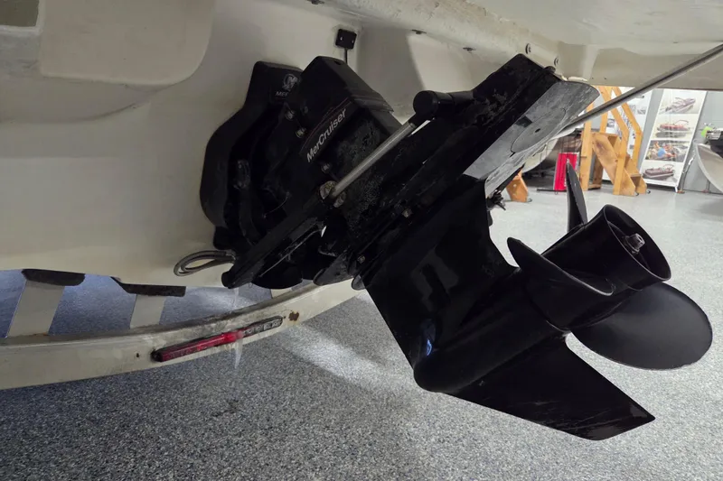 Slide: The Image of 2007 Mariah SX19 boat with MerCruiser outdrive in a garage setting. - 5