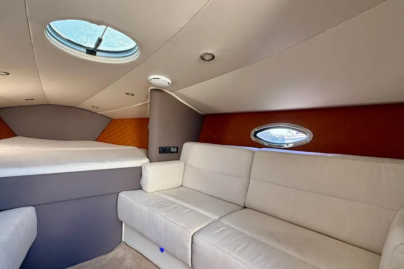Slide: The Image of Luxurious interior of 2012 Hunton XRS 37 yacht with plush seating and bedding. - 18