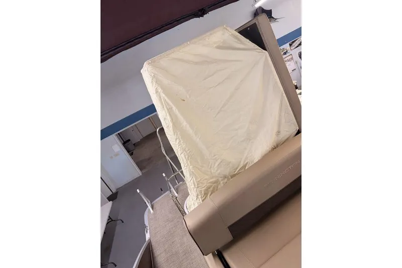 Slide: The Image of 2021 Bennington 23 LSB SPS boat interior with covered seating area. - 6