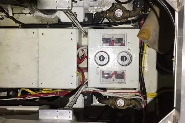 Slide: The Image of Electrical panel and wiring inside a 2004 Carver 420 Mariner boat. - 19