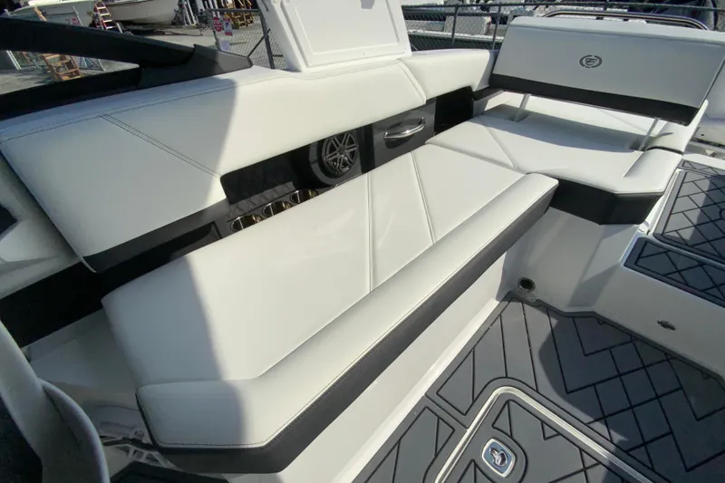Slide: The Image of Luxurious seating on 2026 Cobalt R6 Outboard boat, featuring sleek white upholstery. - 27