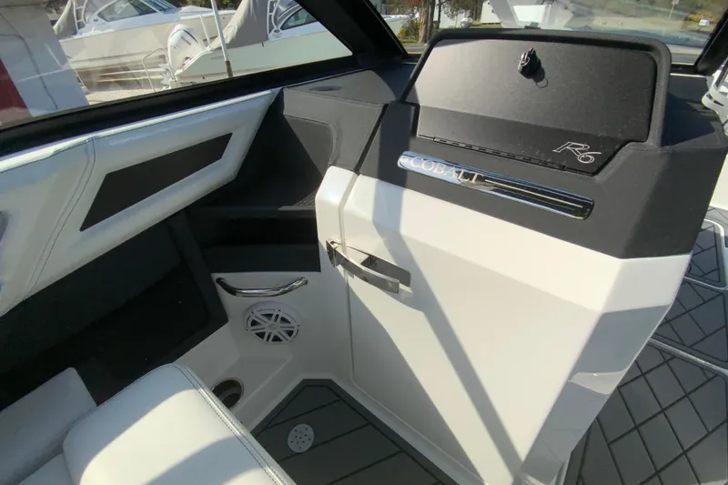 Slide: The Image of Interior view of 2026 Cobalt R6 Outboard boat, showcasing sleek design and modern features. - 40