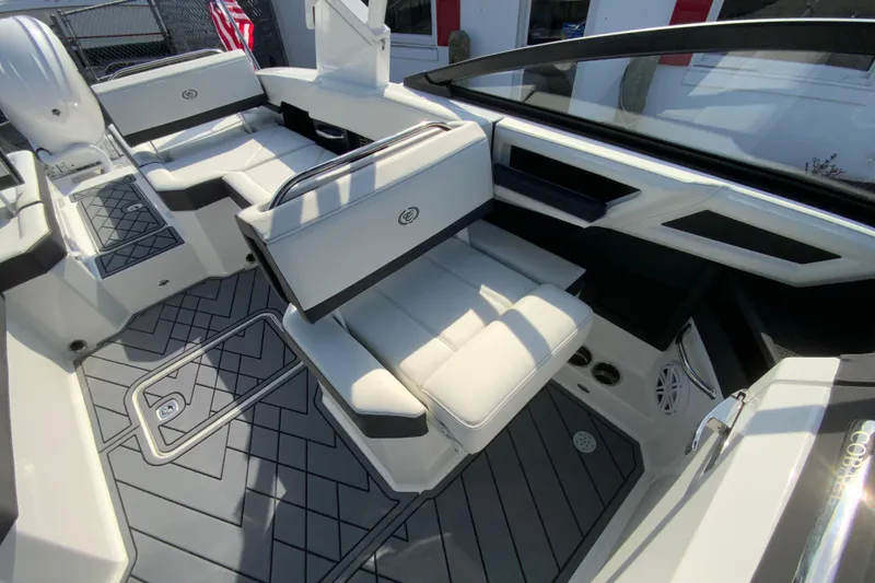 Slide: The Image of 2026 Cobalt R6 Outboard boat interior with sleek white seating and modern design. - 41