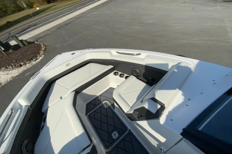 Slide: The Image of 2026 Cobalt R6 Outboard boat interior with sleek white seating and modern design. - 52