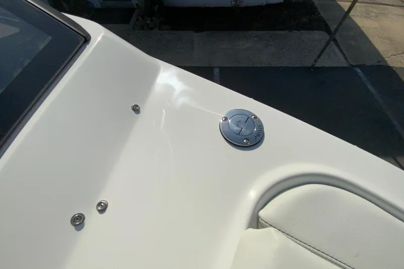 Slide: The Image of 2026 Cobalt R6 Outboard boat deck with fuel cap and seating detail. - 58