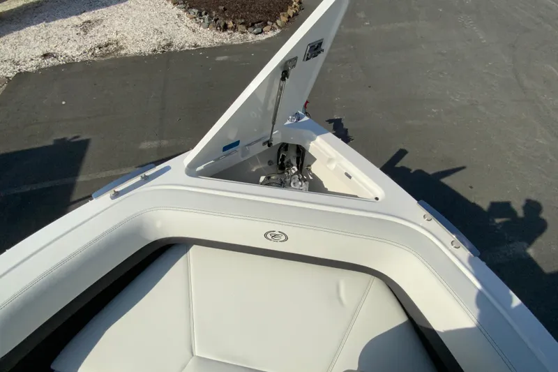 Slide: The Image of 2026 Cobalt R6 Outboard boat bow with open storage compartment. - 60