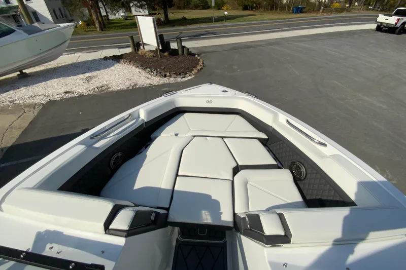 Slide: The Image of 2026 Cobalt R6 Outboard boat with spacious, luxurious seating in a sleek design. - 64