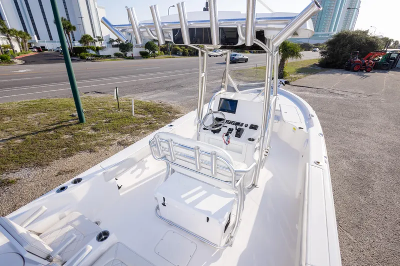 Slide: The Image of 2021 Blue Wave 2600 PureBay boat with sleek design and modern console. - 12