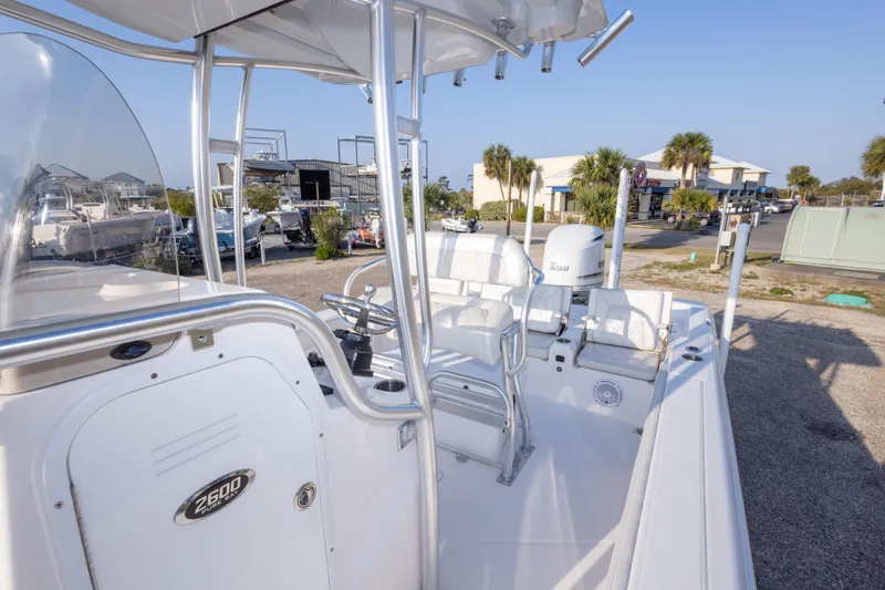 Slide: The Image of 2021 Blue Wave 2600 PureBay boat interior with seating and steering console. - 31