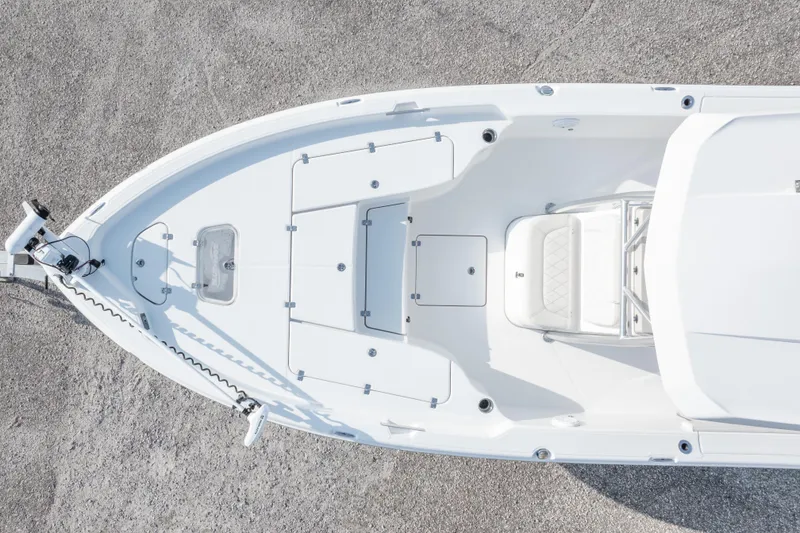 Slide: The Image of Overhead view of 2021 Blue Wave 2600 PureBay boat deck, showcasing sleek design and seating. - 46