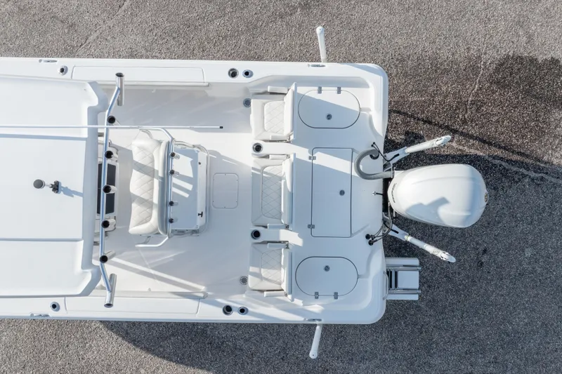 Slide: The Image of Overhead view of 2021 Blue Wave 2600 PureBay boat, showcasing seating and engine layout. - 47