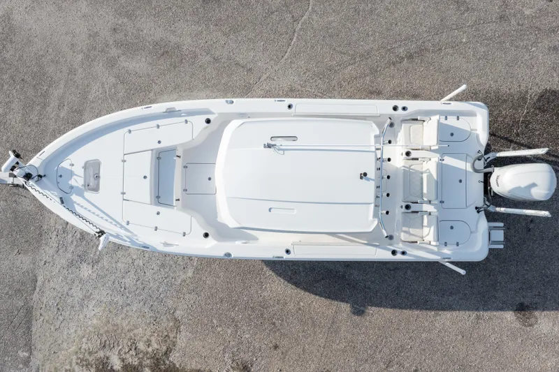 Slide: The Image of Overhead view of 2021 Blue Wave 2600 PureBay boat on concrete surface. - 48