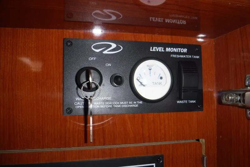 Slide: The Image of 2006 Regal Commodore 3560 IO level monitor panel for freshwater and waste tanks. - 23