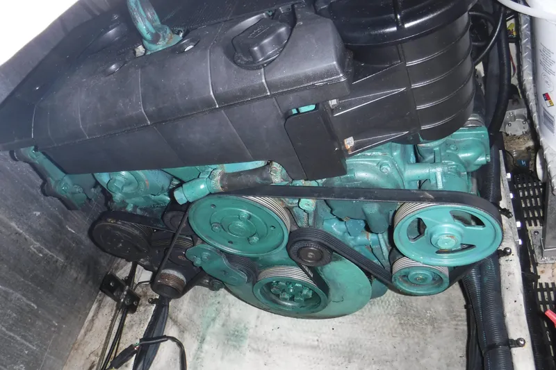 Slide: The Image of Engine compartment of a 2006 Regal Commodore 3560 IO boat, showcasing mechanical components. - 7