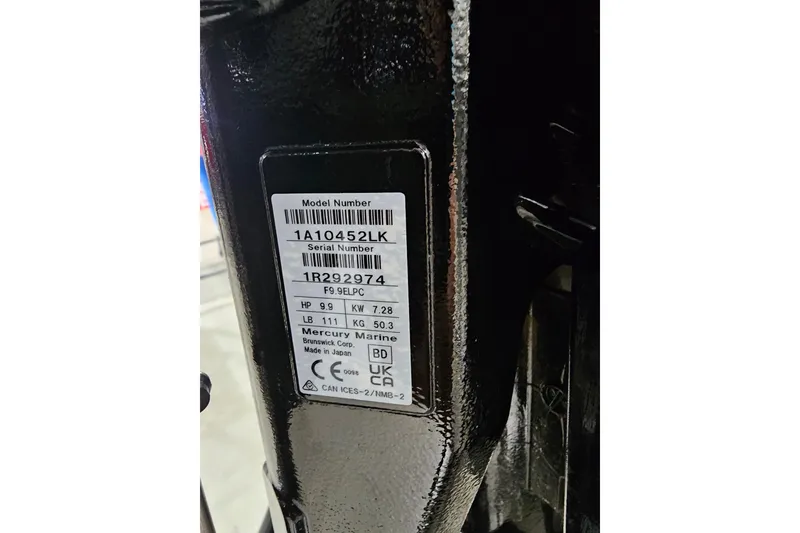 Slide: The Image of Label on 2024 Mercury 9.9HP EFI ProKicker 4S outboard motor, showing model and serial numbers. - 4