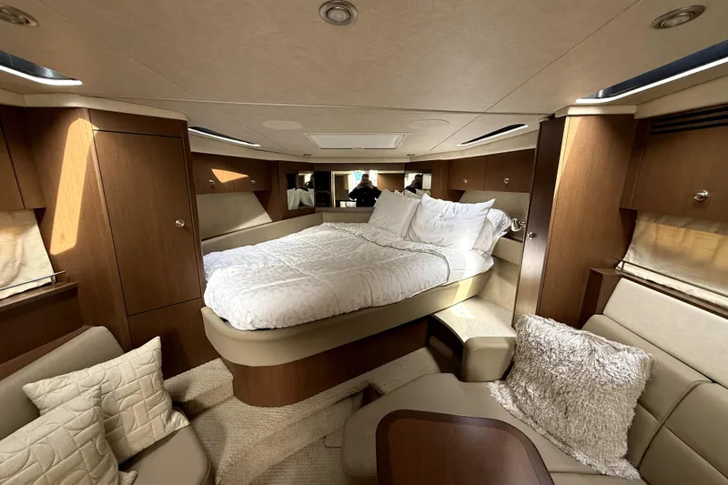 Slide: The Image of Luxurious interior of 2013 Sea Ray Sundancer 350 yacht with cozy bed and elegant furnishings. - 11