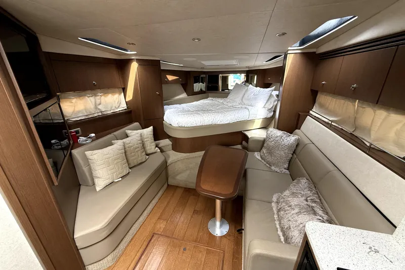 Slide: The Image of Luxurious interior of 2013 Sea Ray Sundancer 350 yacht with cozy seating and modern amenities. - 12