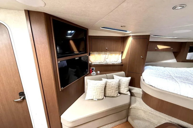 Slide: The Image of Luxurious interior of 2013 Sea Ray Sundancer 350 yacht with cozy seating and modern amenities. - 18