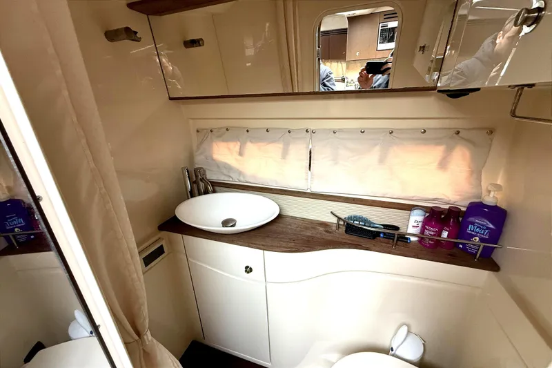 Slide: The Image of Luxurious bathroom interior of 2013 Sea Ray Sundancer 350 yacht with modern amenities. - 21