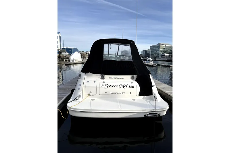 Slide: The Image of Interior of 2013 Sea Ray Sundancer 350 yacht with helm and kitchenette area. - 3