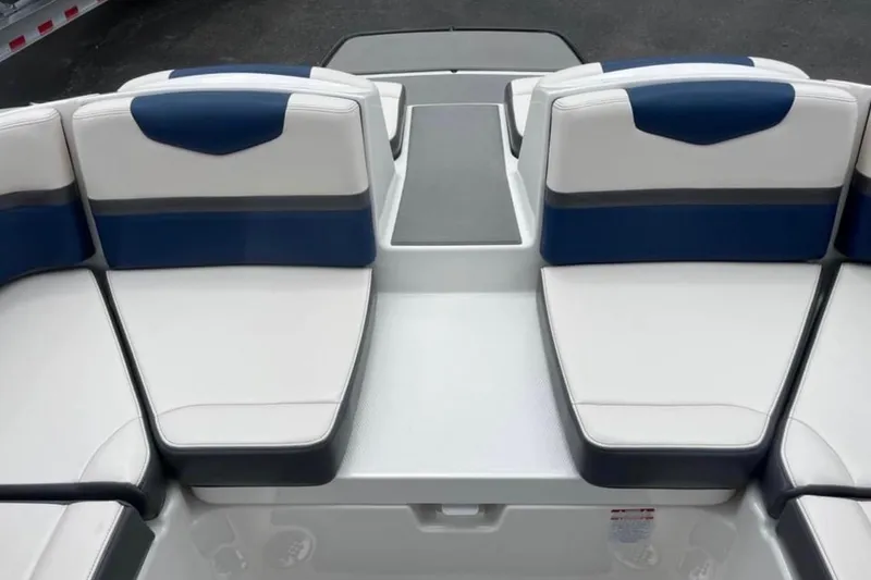 Slide: The Image of 2016 Chaparral Vortex 243 VRX boat interior with white and blue seating. - 3