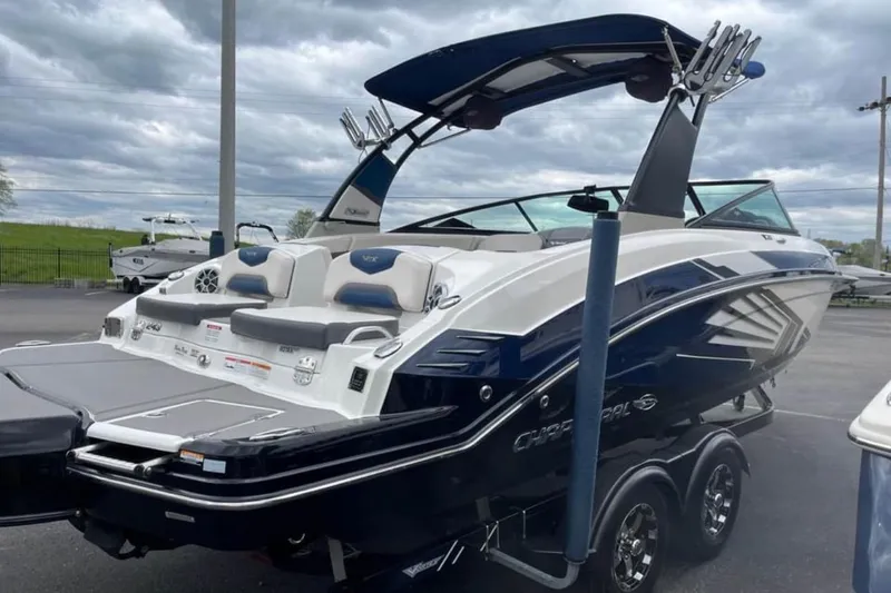 Slide: The Image of 2016 Chaparral Vortex 243 VRX boat on trailer, showcasing sleek design and modern features. - 9