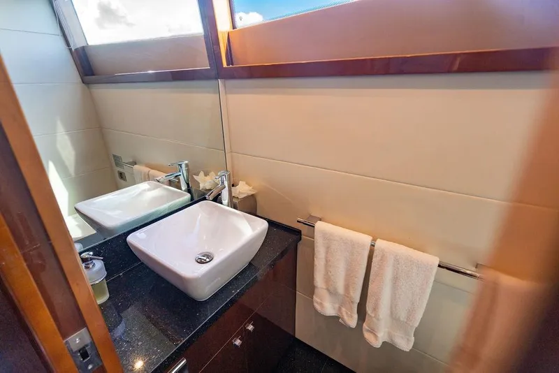 Slide: The Image of Luxurious bathroom in 2010 Princess 95 Motor Yacht with modern sink and elegant design. - 106
