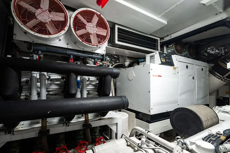 Slide: The Image of Engine room of 2010 Princess 95 Motor Yacht with Cummins Onan generator. - 116