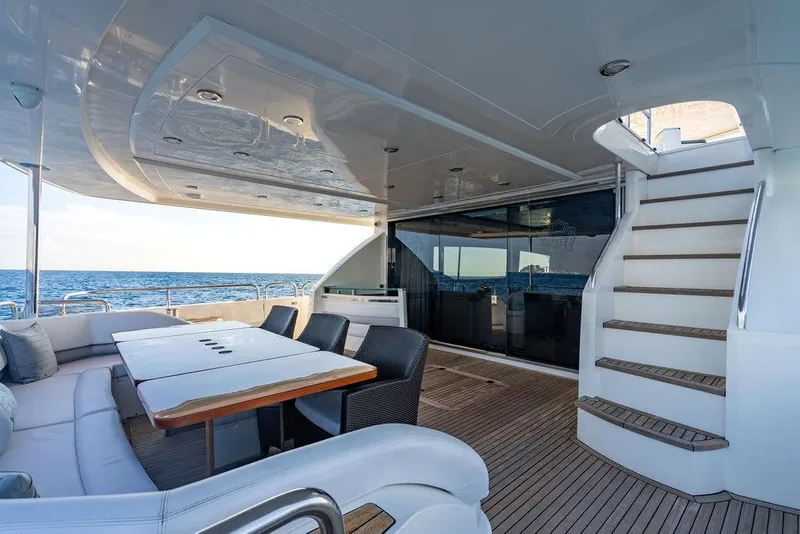 Slide: The Image of Luxurious deck of 2010 Princess 95 Motor Yacht with seating and ocean view. - 30