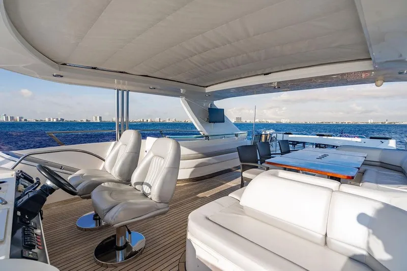 Slide: The Image of Luxurious 2010 Princess 95 Motor Yacht with spacious deck and elegant seating. - 43