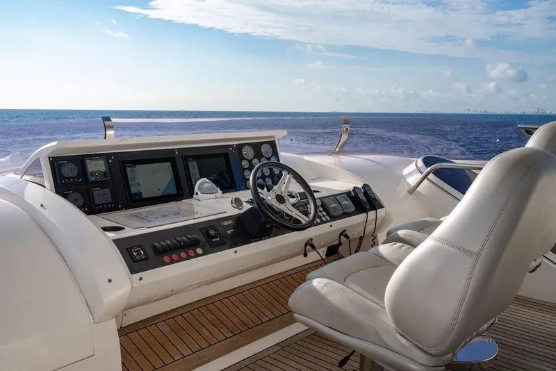 Slide: The Image of Helm of 2010 Princess 95 Motor Yacht with ocean view and navigation equipment. - 55