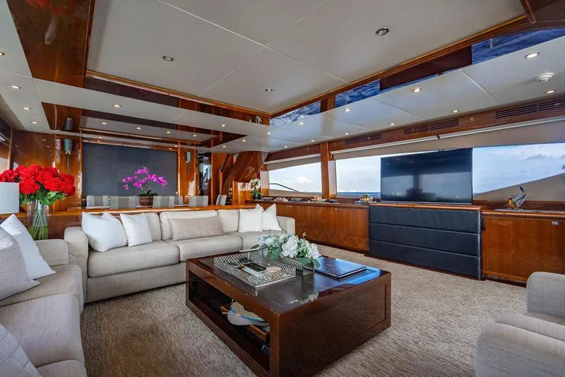 Slide: The Image of Luxurious interior of 2010 Princess 95 Motor Yacht with elegant seating and large windows. - 59