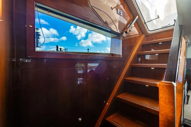 Slide: The Image of Interior staircase of 2010 Princess 95 Motor Yacht with window view. - 76
