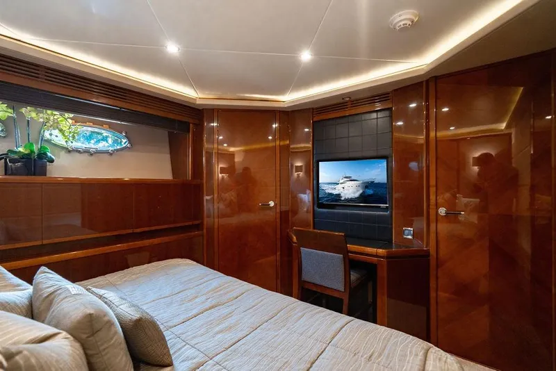Slide: The Image of Luxurious cabin interior of 2010 Princess 95 Motor Yacht with elegant wood finish. - 81