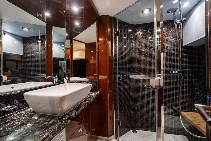 Slide: The Image of Luxurious bathroom in 2010 Princess 95 Motor Yacht with modern fixtures and elegant design. - 89