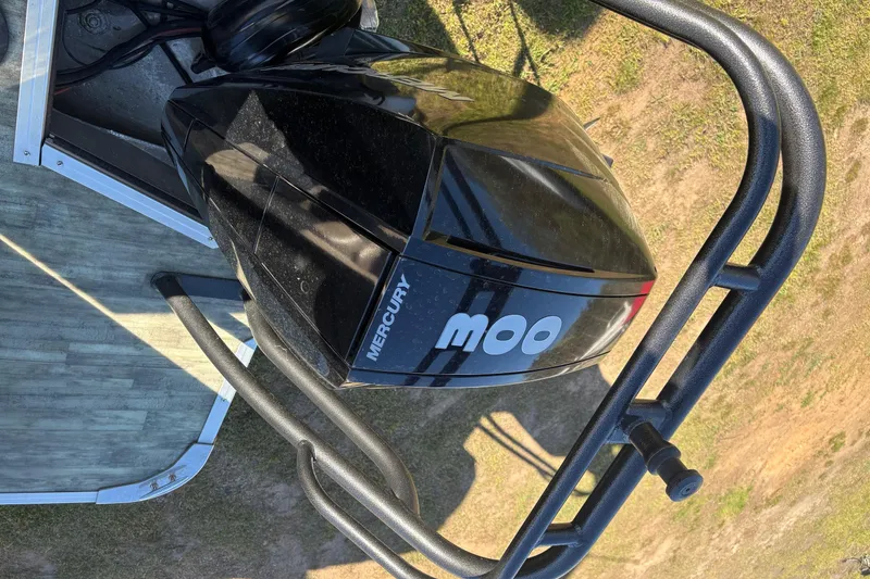 Slide: The Image of Overhead view of a 2022 Crest Continental 250 boat with Mercury engine. - 11